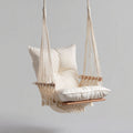 Hammock chair with cushioned seat and wooden frame for indoor or outdoor use